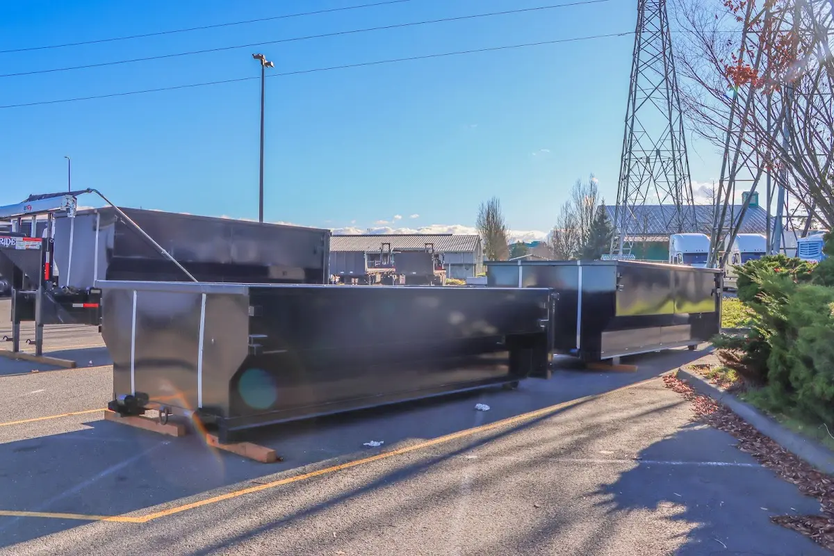 Roll-off dumpster ready for waste disposal at job site for 3 Yard Dumpster Rental in Lyndhurst